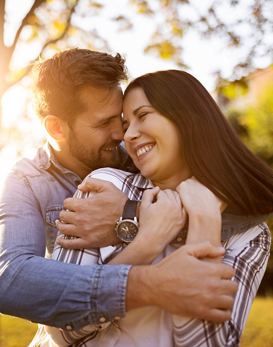Young Couple in Love having fun on a sunny autumn day